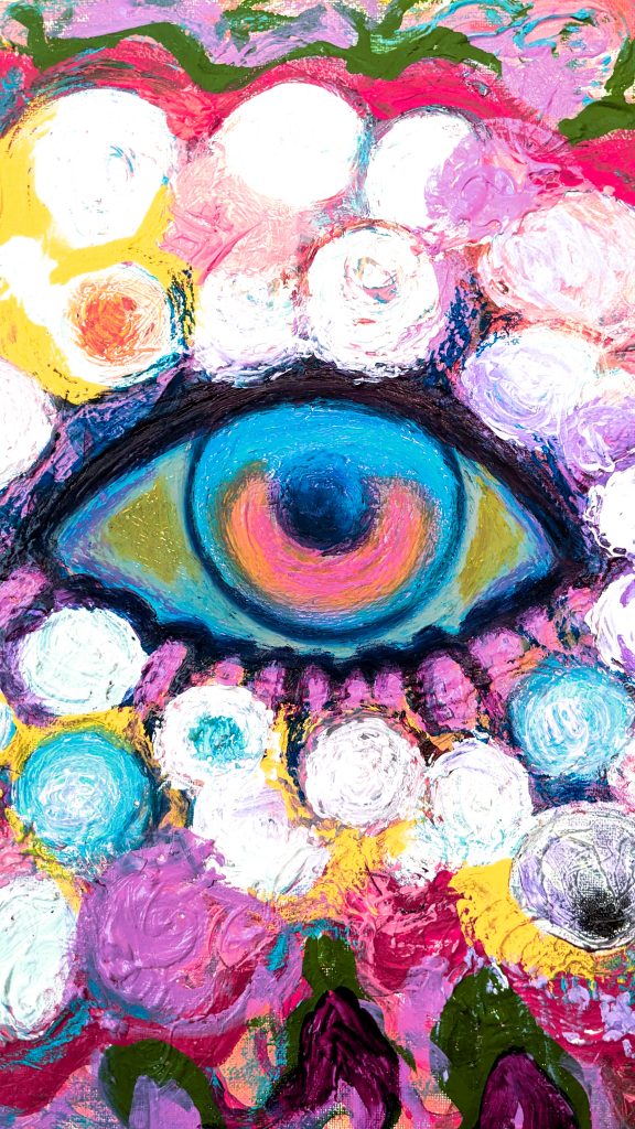 Close up. A vibrant abstract painting featuring a detailed eye in the center, surrounded by swirling, colorful textures in pink, purple, blue, and green, with white orbs framing the eye.